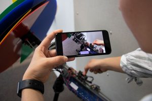 Presenting live video from a phone in a Teams meeting